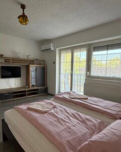 Exclusive Családi Apartman · 5 fő · 56 m² — Három generáció, egy fedél: ideális nagyszülős nyaraláshoz vagy nagyobb családnak.